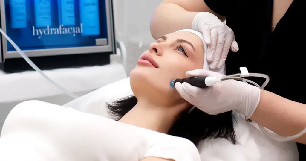A woman receiving HydraGlo Facials in Marietta, GA